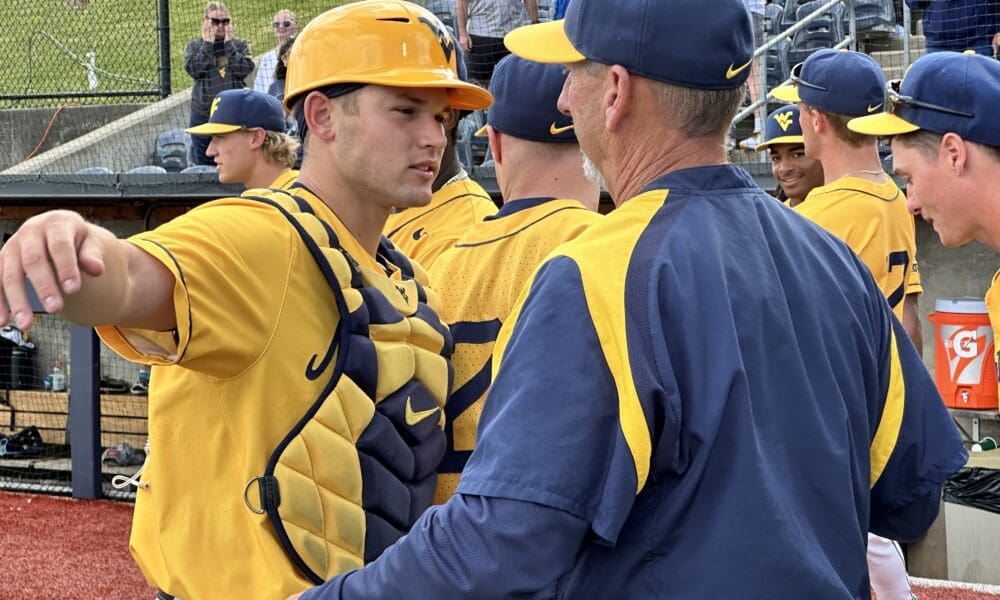 WVU Baseball HC Randy Mazey with team