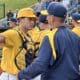 WVU Baseball HC Randy Mazey with team
