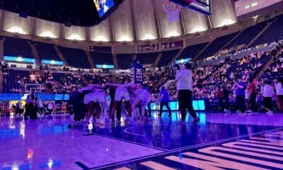 WVU Women's Basketball team huddle