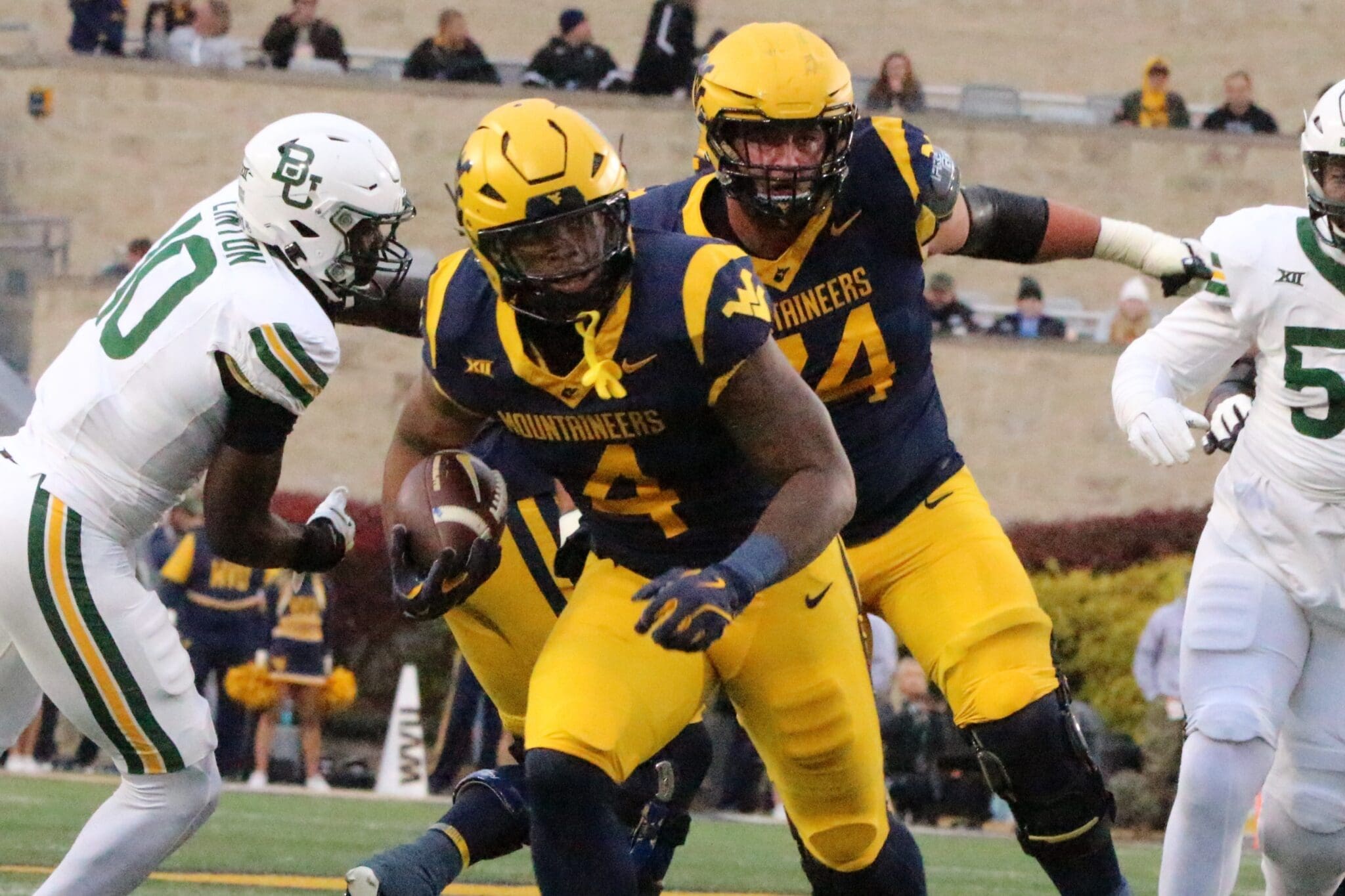 WVU Football RB CJ Donaldson and OL Wyatt Milum