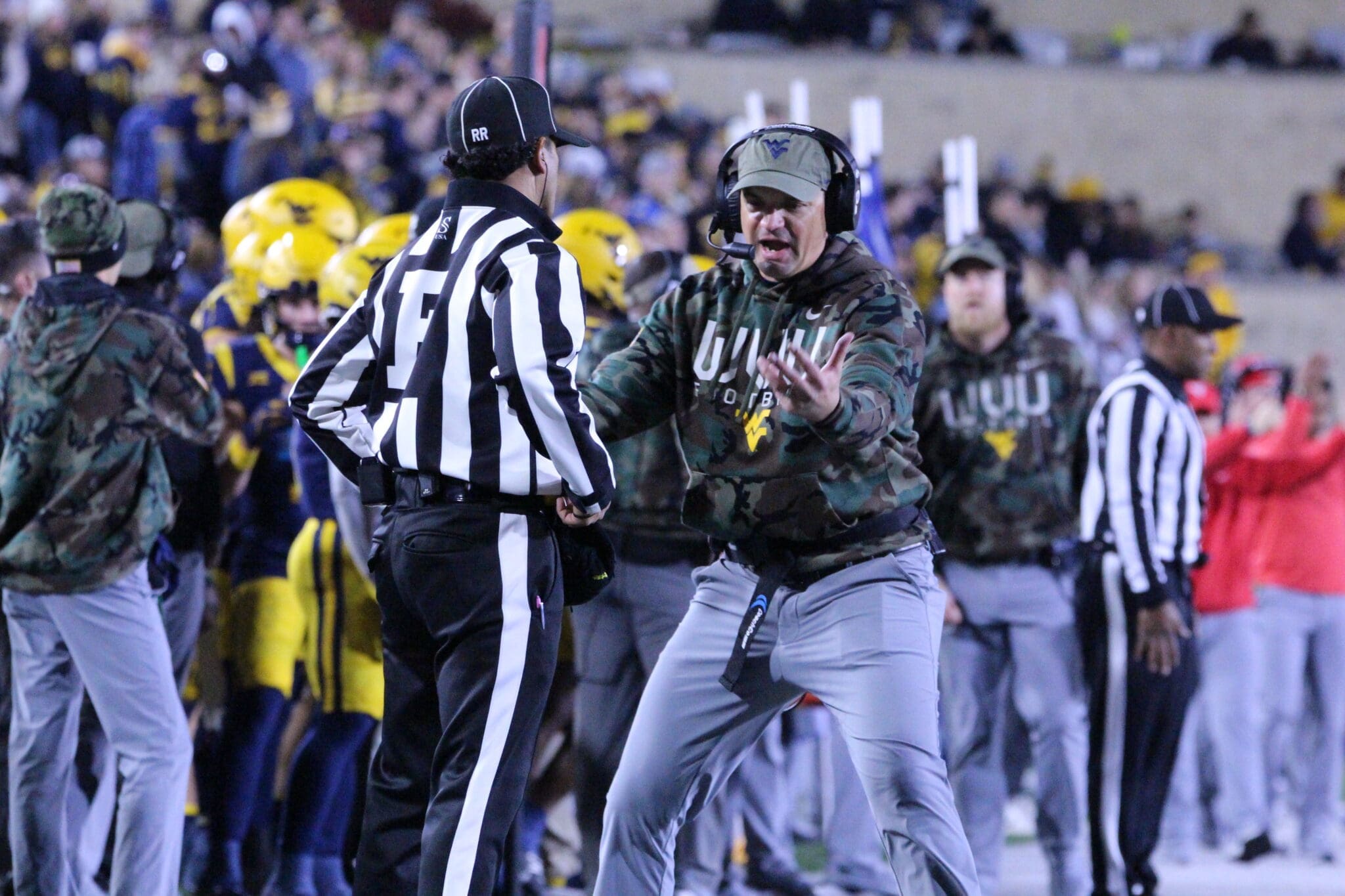 WVU Football HC Neal Brown and ref