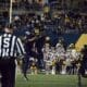 WVU Football Defense with Sean Martin and Aubrey Burks celebrates over BYU