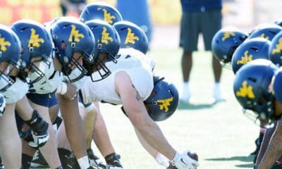 WVU Football line of scrimmage stock