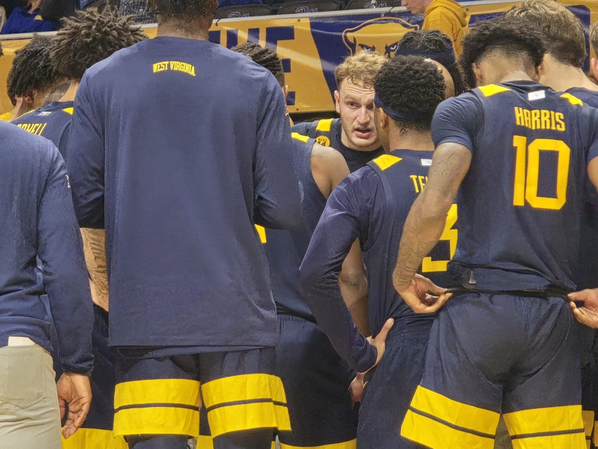 WVU Basketball Huddle led by Tucker DeVries