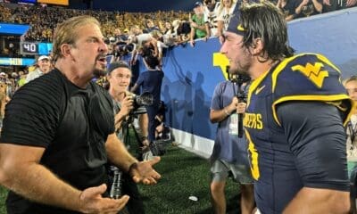 WVU Football QB Nicco Maerchiol Celebrate Backyard Brawl Win with his father.