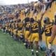 WVU Football players with fans