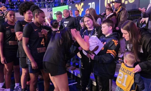 WVU Women's Basketball with fans