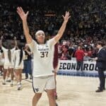 WVU Women's Basketball Celia Riviere thanks the Hope Coliseum crowd