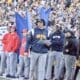 WVU Football HC Neal Brown on sidelines with Bilal Marshall