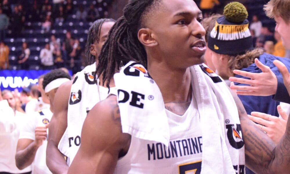 WVU Basketball Javon Small high fives fans