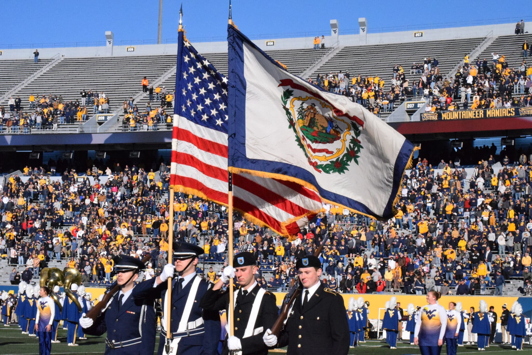 WVU Football Milan Puskar Stadium- American/WV Flag stock