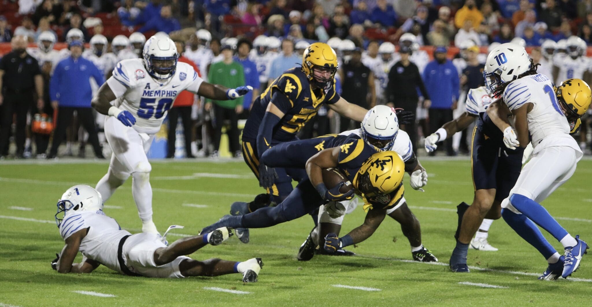 WVU Football CJ Donaldson tackled by Memphis in Frisco Bowl