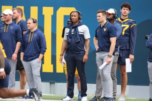 Pat White on WVU sidelines with Kole Taylor