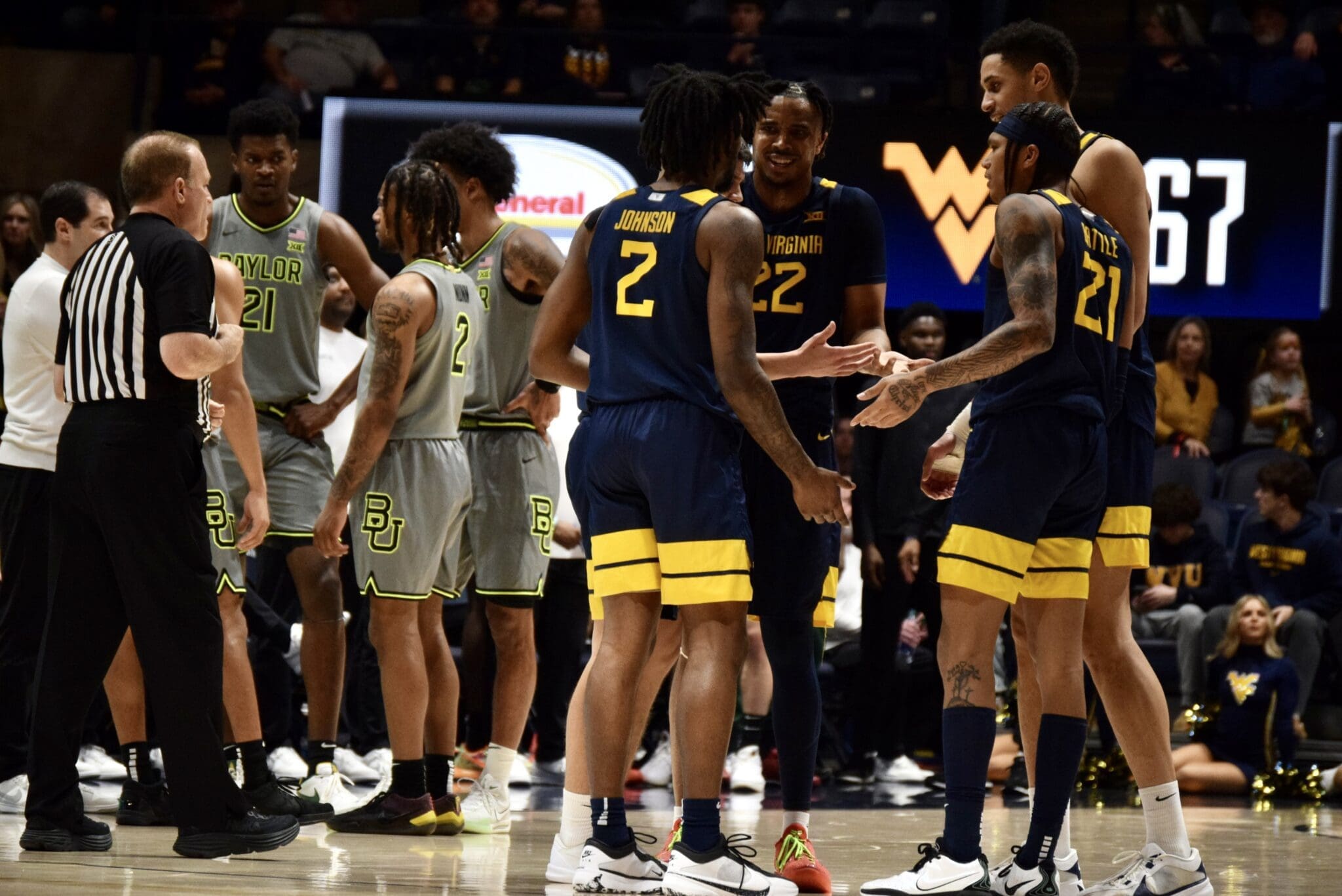 WVU Basketball huddle/Baylor Bears huddle