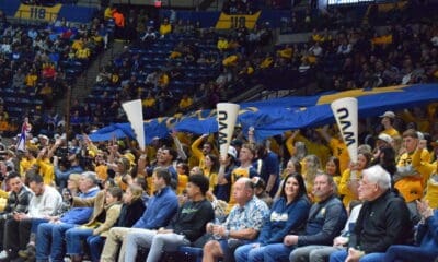 WVU Basketball fans in crowd stock