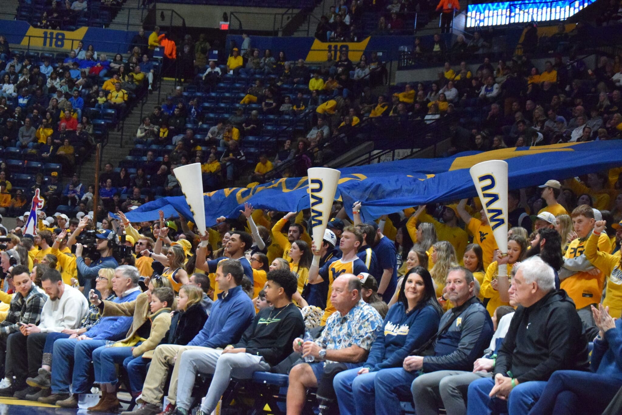 WVU Basketball fans in crowd stock