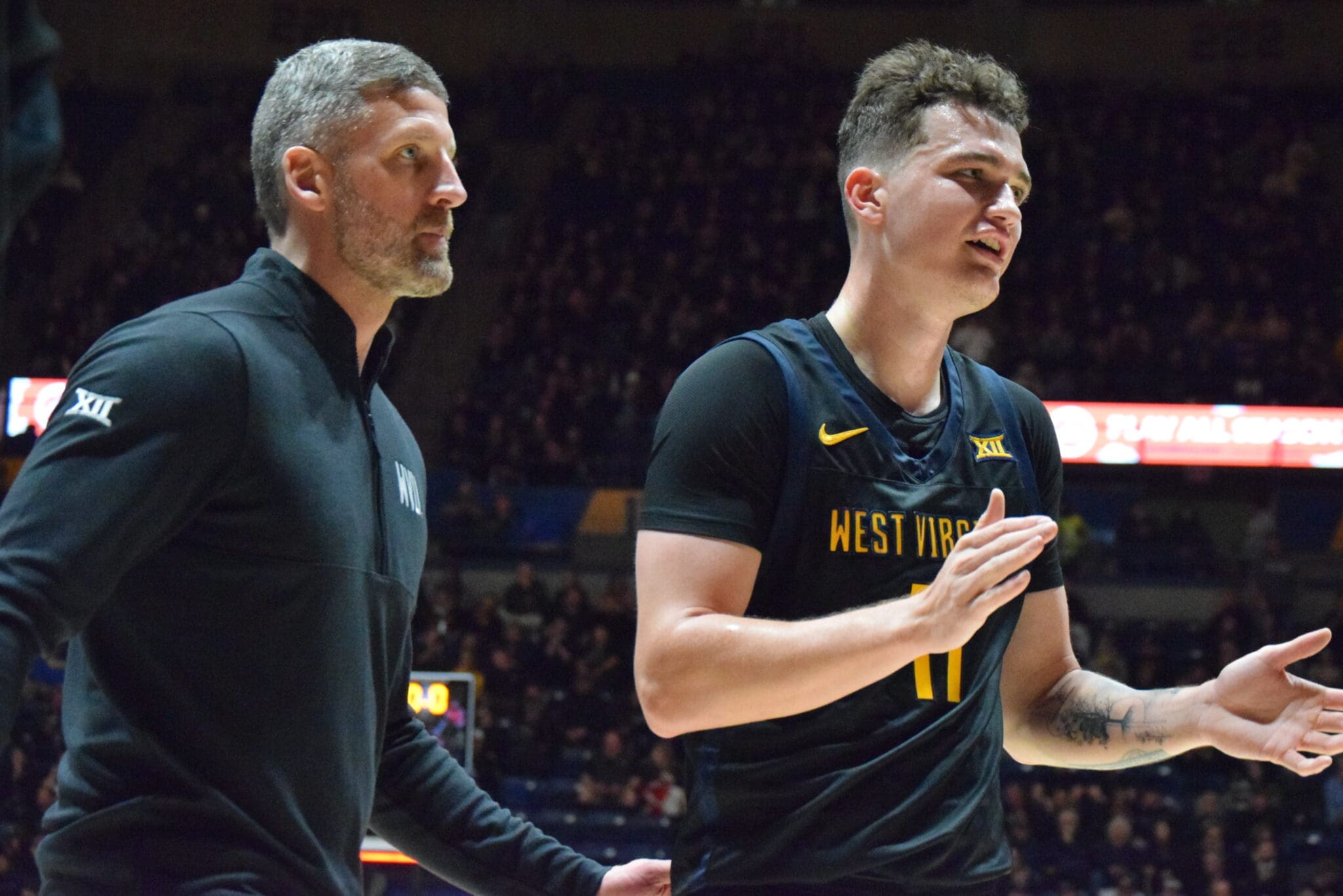 WVU Basketball HC Josh Eilert and Quinn Slazinski