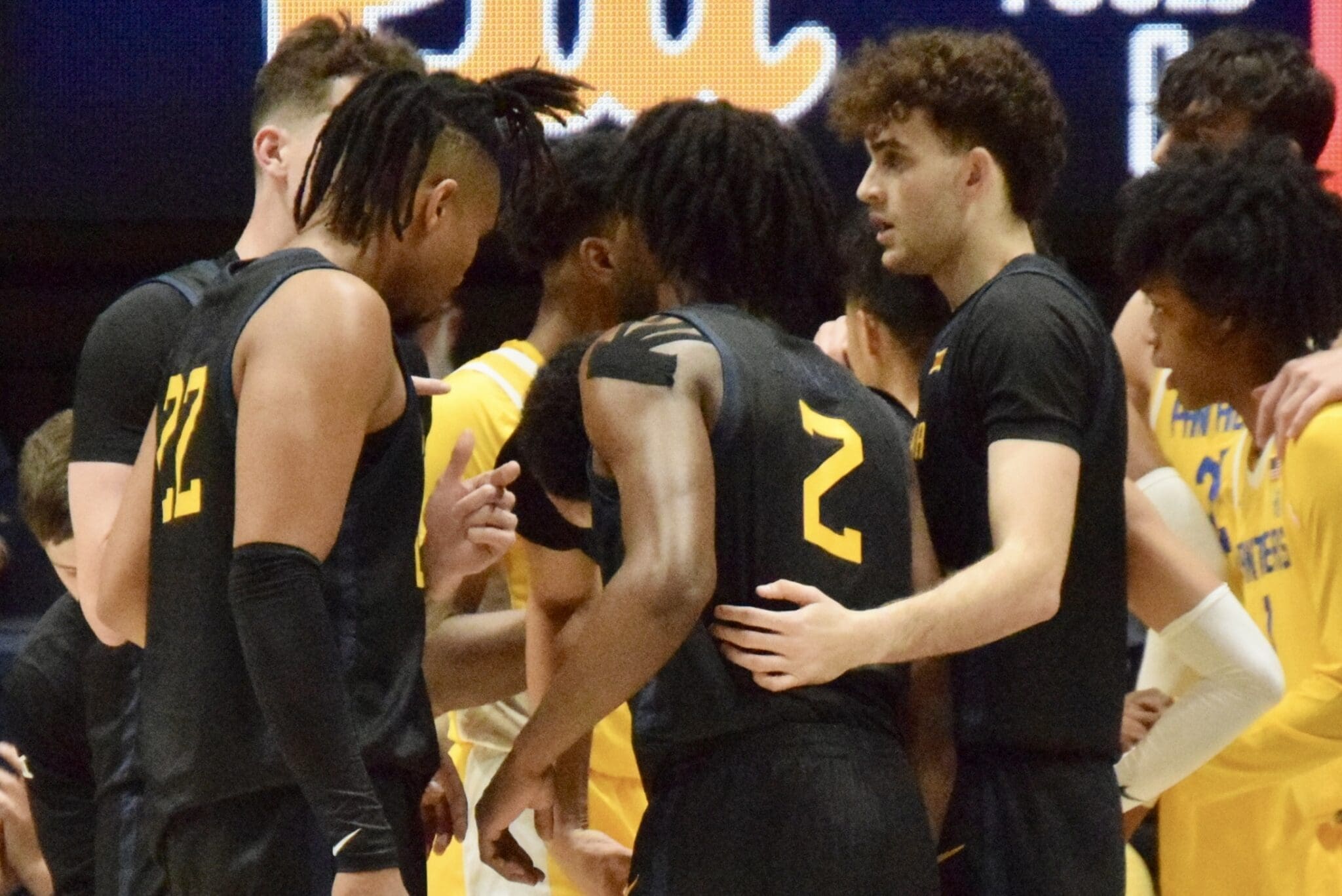 WVU Basketball Huddle Book Exchange