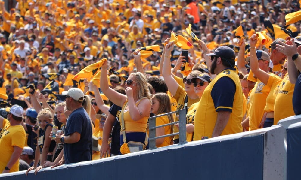 WVU Football fans crowd shot stock