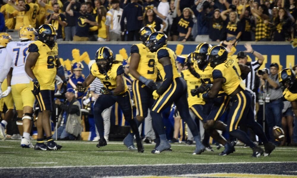 WVU Football celebrates against Pitt in Backyard Brawl