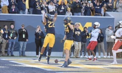 WVU Football RB Jahiem White celebrates TD