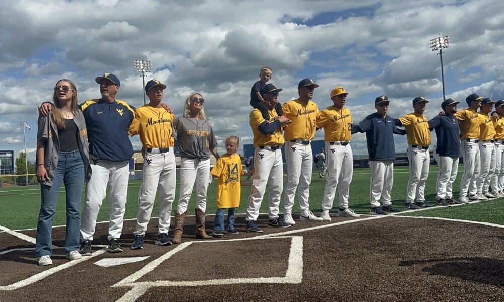 WVU Baseball HC Randy Mazey sings Country Roads after last home game with family and his team