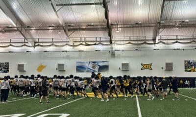 WVU Football with flag