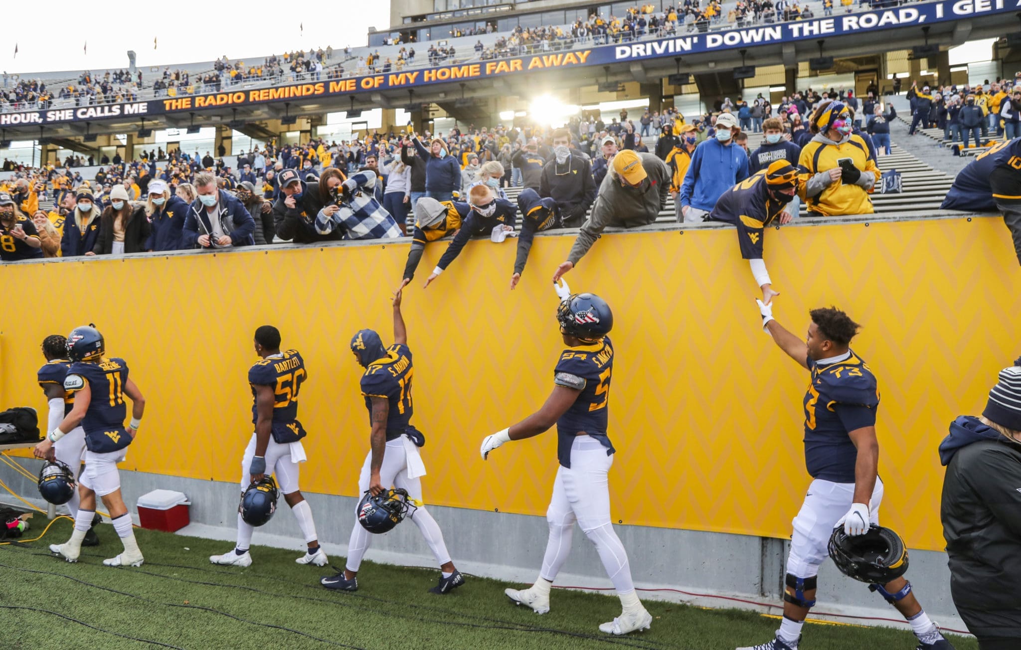 WVU football players and fans