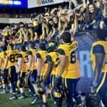 West Virginia Football players celebrating