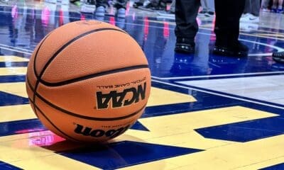 WVU Basketball on court stock