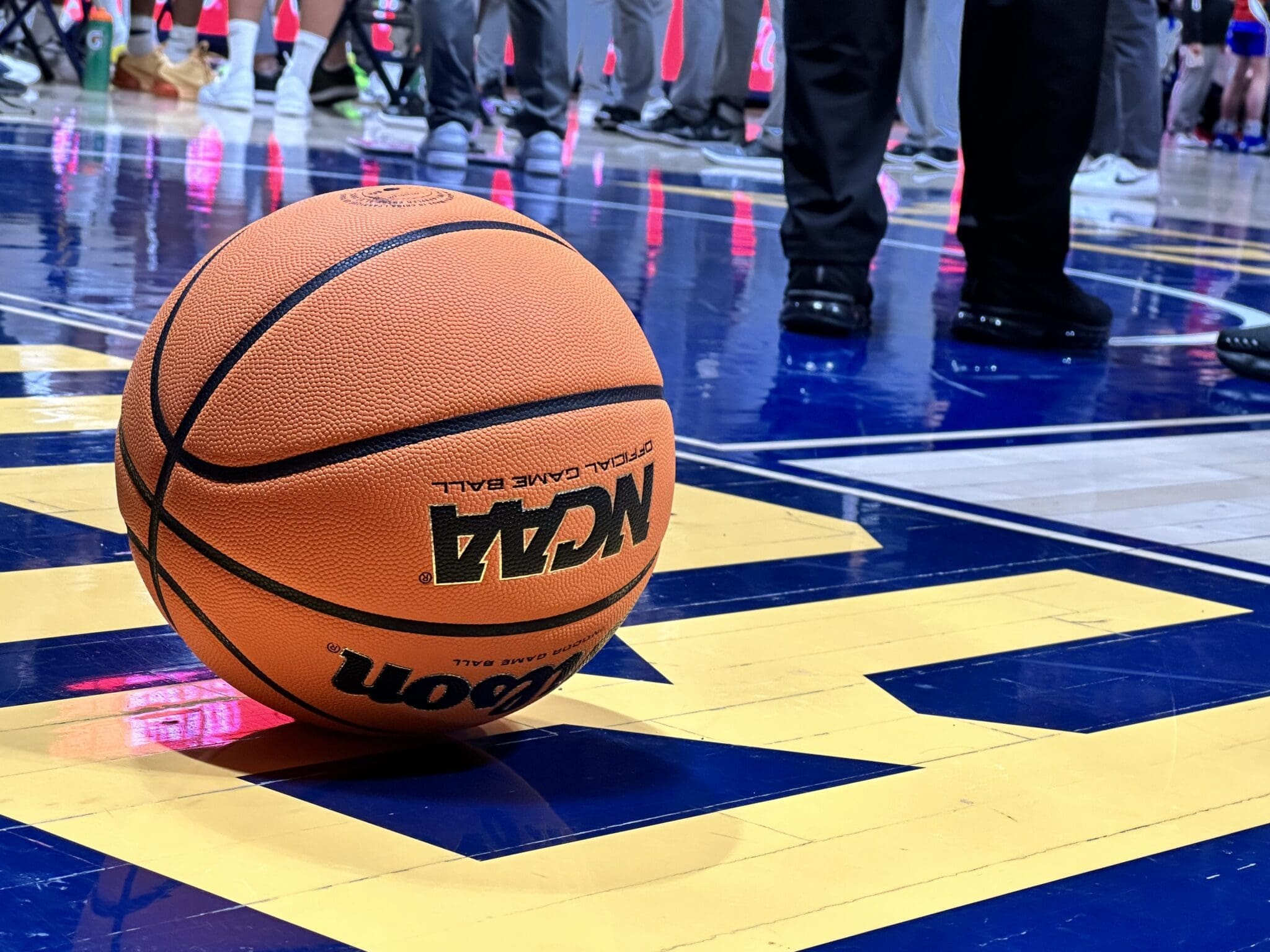 WVU Basketball on court stock