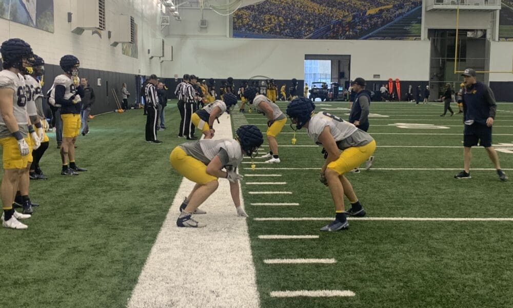 WVU TE coach Blaine Stewart with tight ends