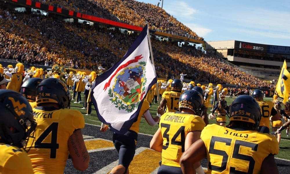 WVU football stock with flag