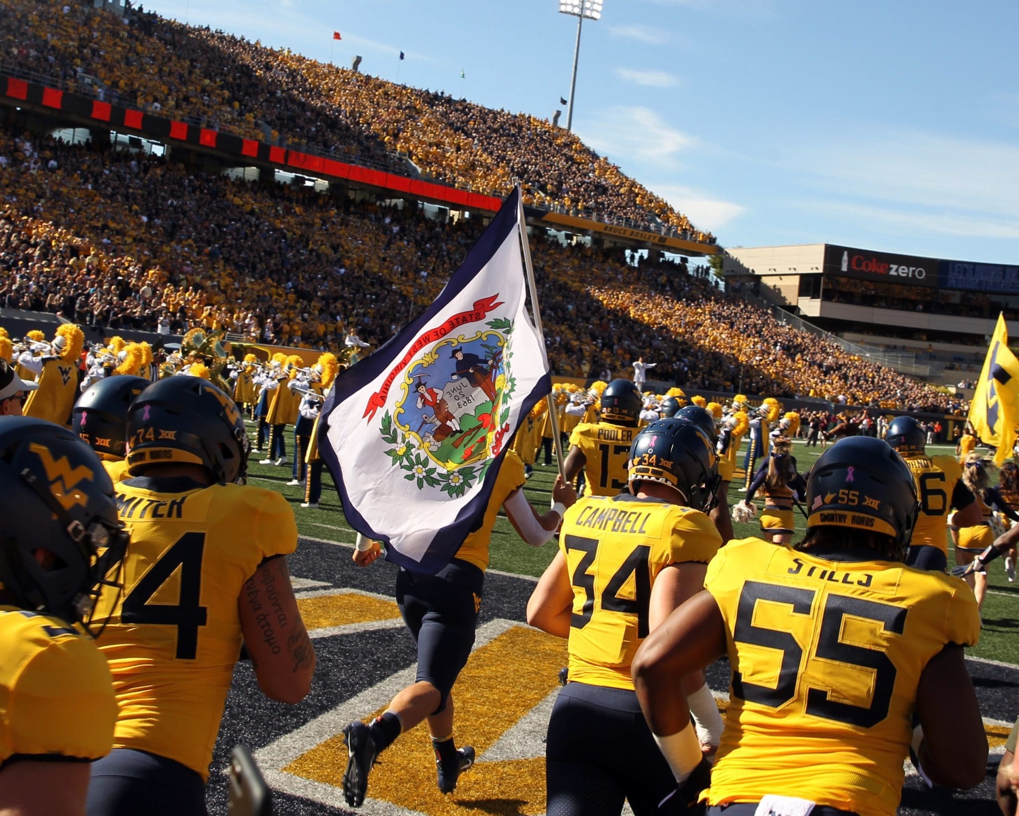 WVU football stock with flag