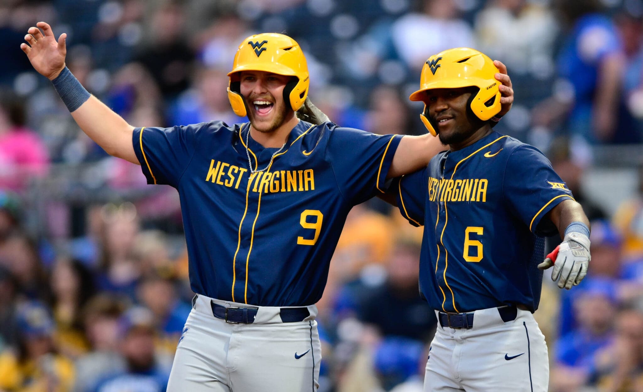 WVU Baseball players Grant Hussey celebrating with Skylar King