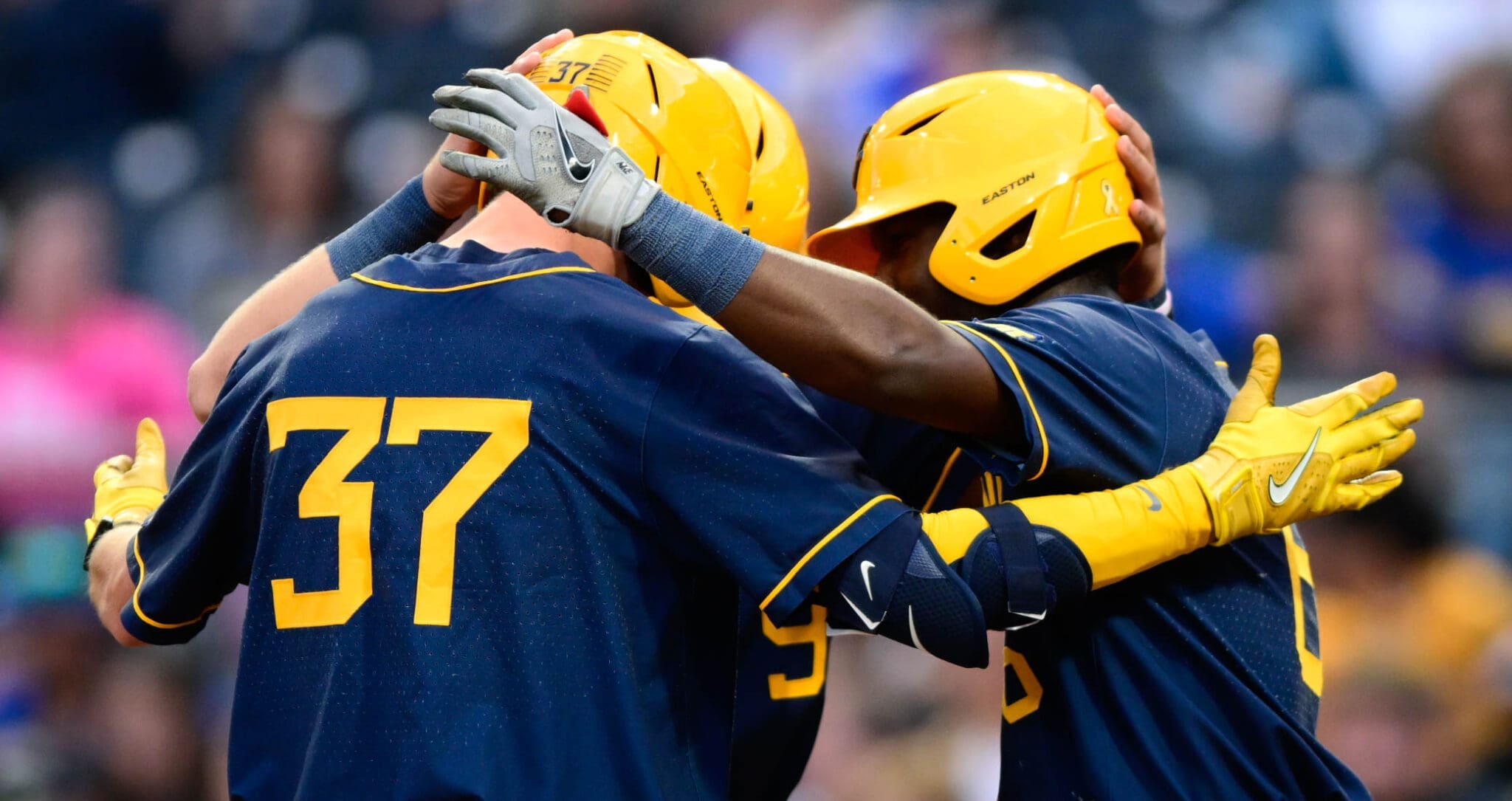 WVU Baseball players celebrating