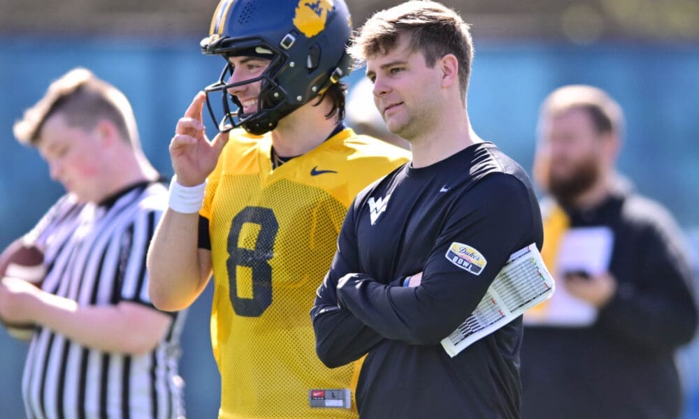 WVU Football QB Coach Tyler Allen with QB Nicco Marchiol