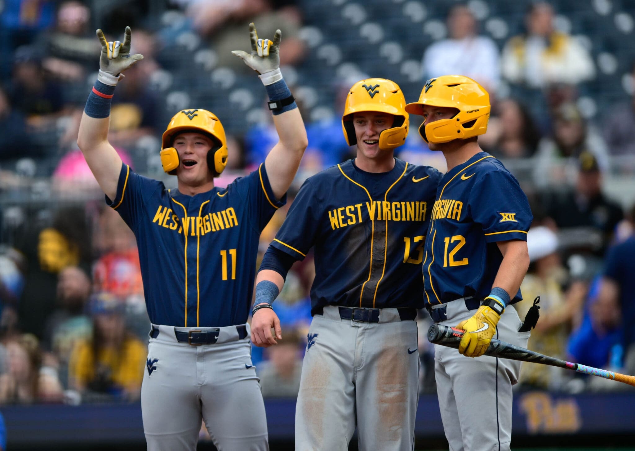 WVU Baseball celebrating Backyard Brawl win over Pitt at PNC Park