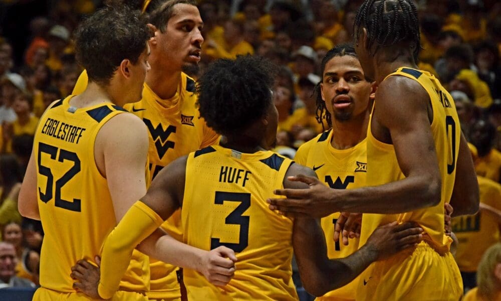 WVU Basketball huddle