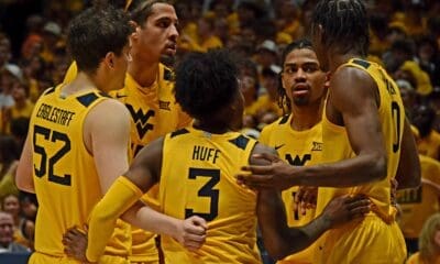 WVU Basketball huddle