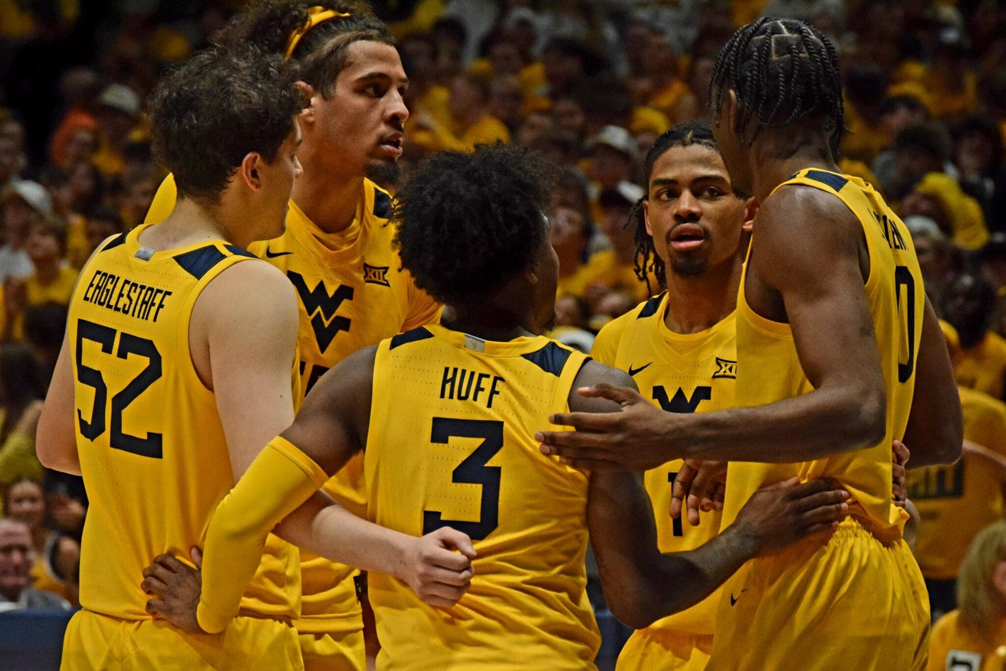 WVU Basketball huddle