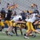WVU Football Nicco Marchiol tackled at Spring Showcase