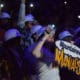 Mountaineer Maniacs sign in WVU basketball crowd
