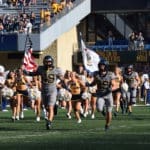 WVU football with US and WV flag