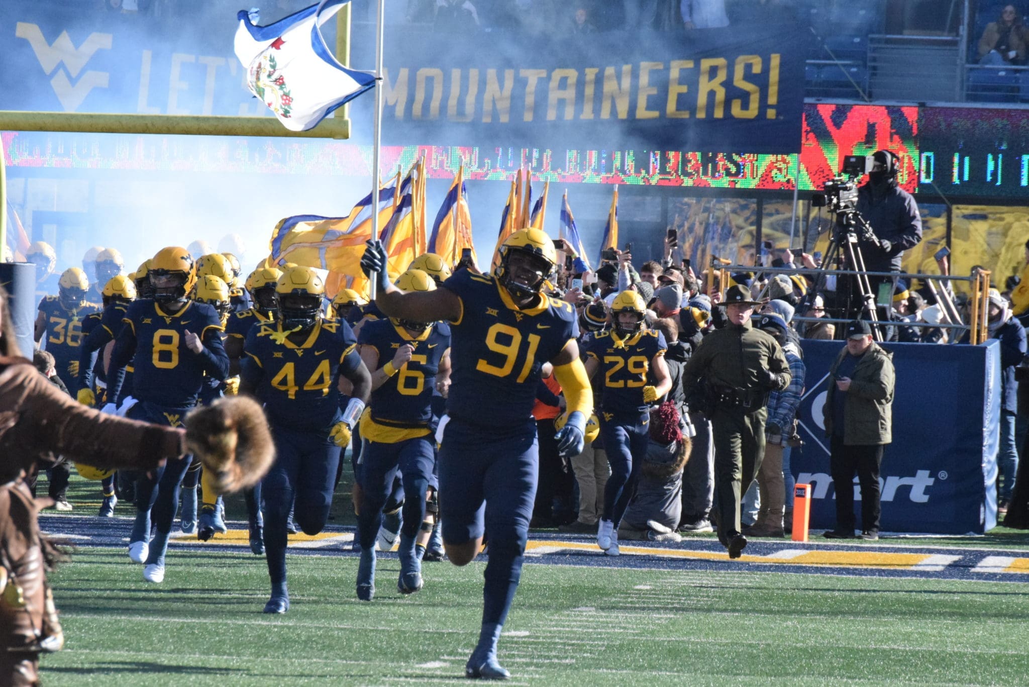 WVU Football DL Sean Martin with flag