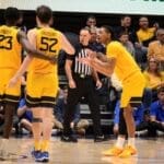 WVU Basketball Honor Huff clapping to Treysen Eaglestaff against Pitt