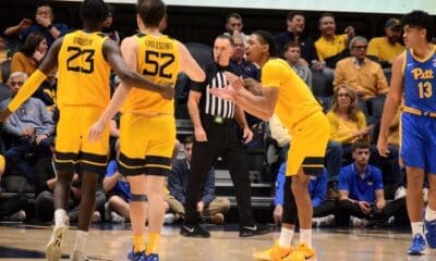 WVU Basketball Honor Huff clapping to Treysen Eaglestaff against Pitt