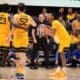 WVU Basketball Honor Huff clapping to Treysen Eaglestaff against Pitt