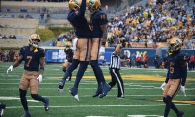 WVU Football CB Nick Taylor (19) celebrates interception versus Utah
