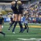 WVU Football CB Nick Taylor (19) celebrates interception versus Utah